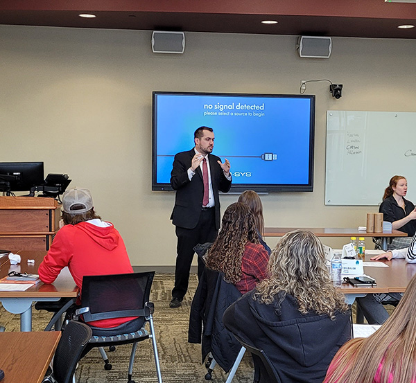 Jason Sausser presents at the Teen Leadership Program